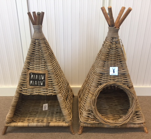 is a basket made of straw in the shape of a teepee copyright protected